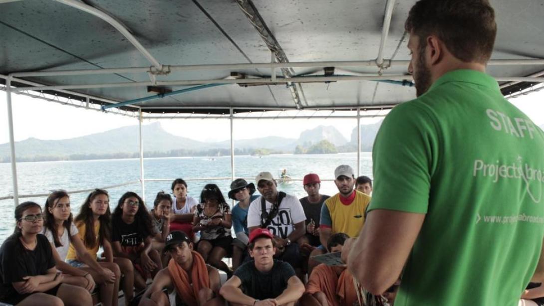 Diving volunteers are briefed by staff before a dive Diving volunteers are briefed by staff before a dive